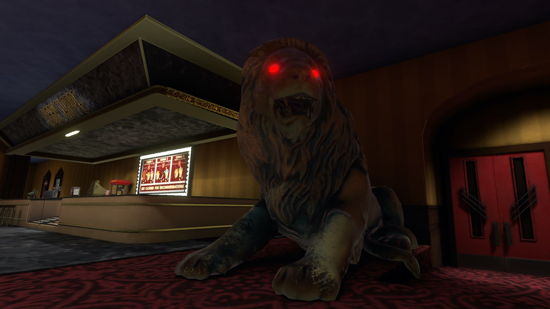 The lobby of the cinema with a large lion statue.