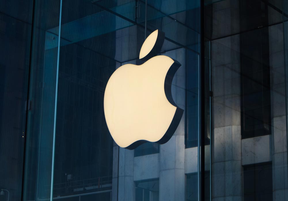 The Apple logo on an Apple Store. A bitten apple.