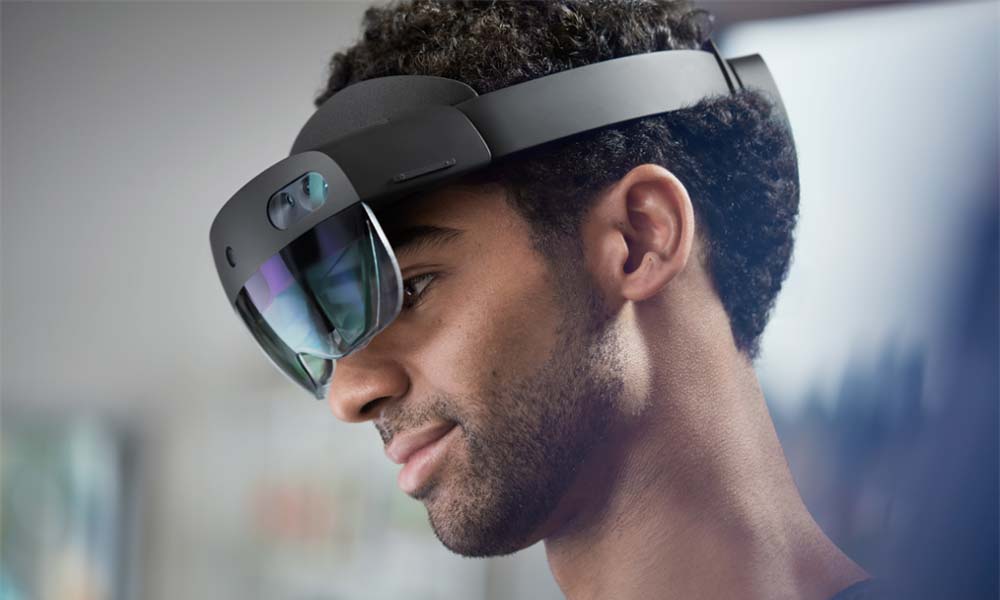 A man wearing Hololens 2 AR glasses