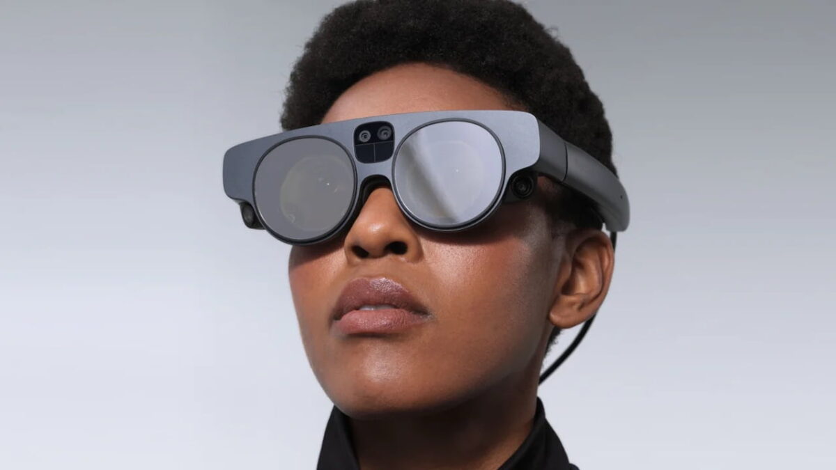 A woman with Magic Leap 2 on her face.