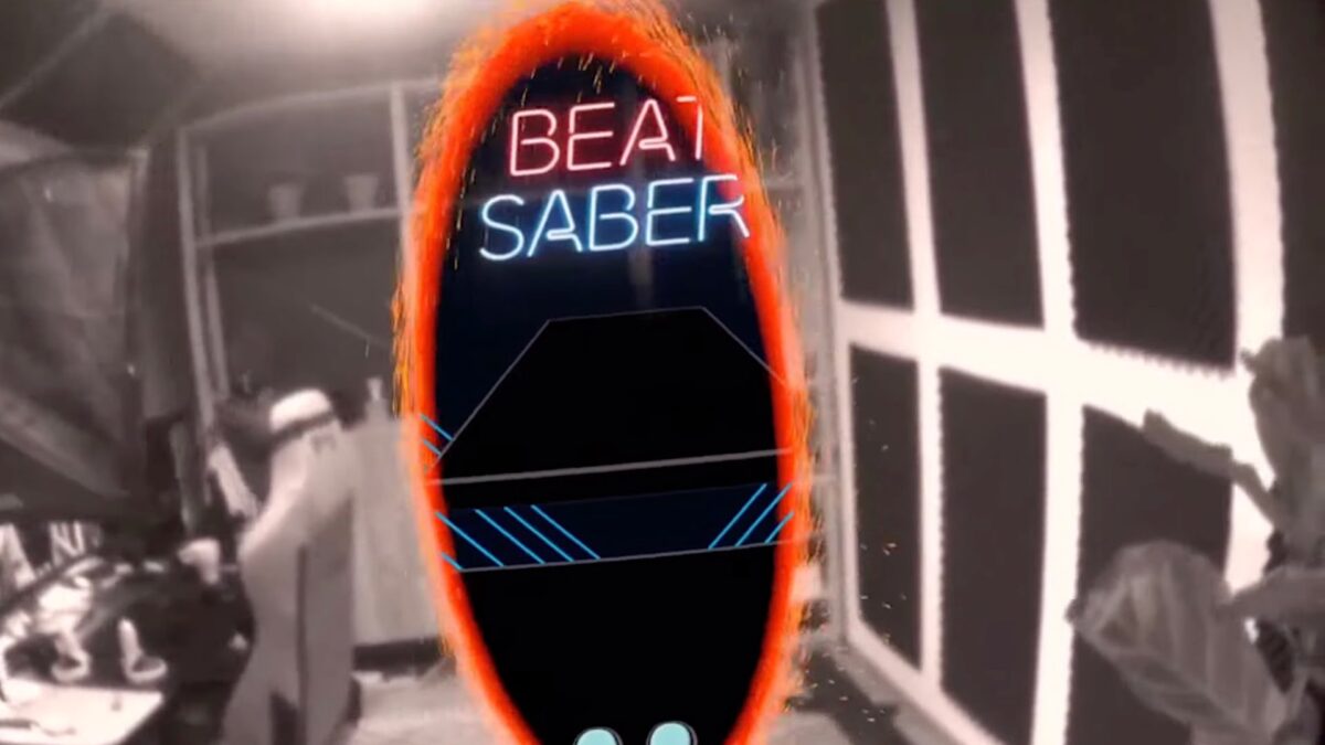 An AR portal into the VR game Beat Saber opens in physical space.
