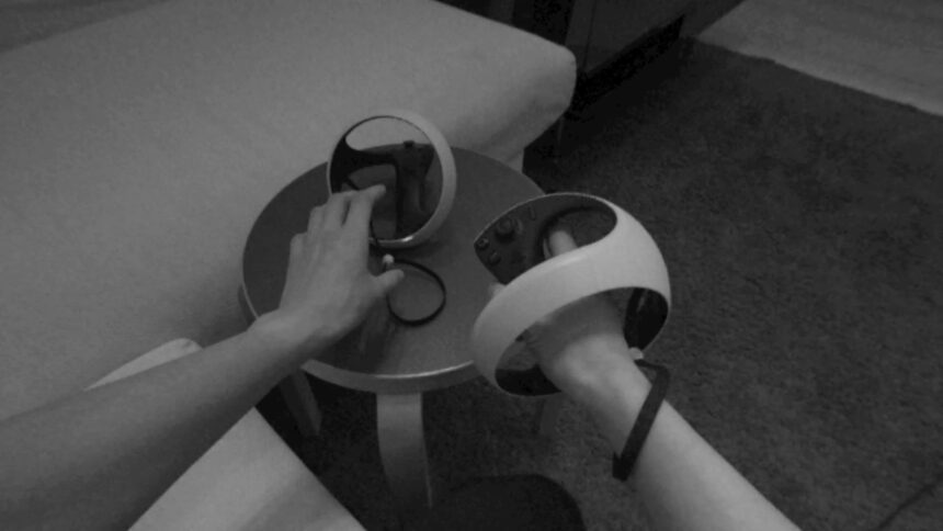 A black and white image of the hands and Sense controller filmed by the front cameras.