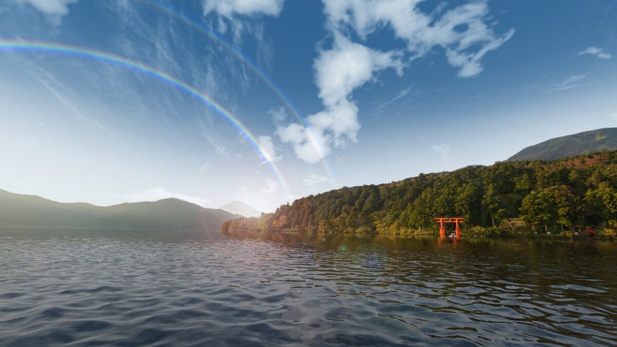 Tranquil Japanese fishing spot with rainbow.