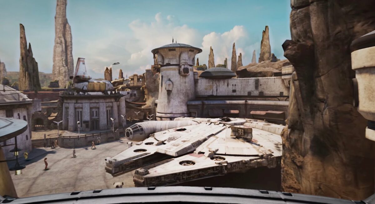 The Millennium Falcon, with the Black Spire Outpost settlement behind it.