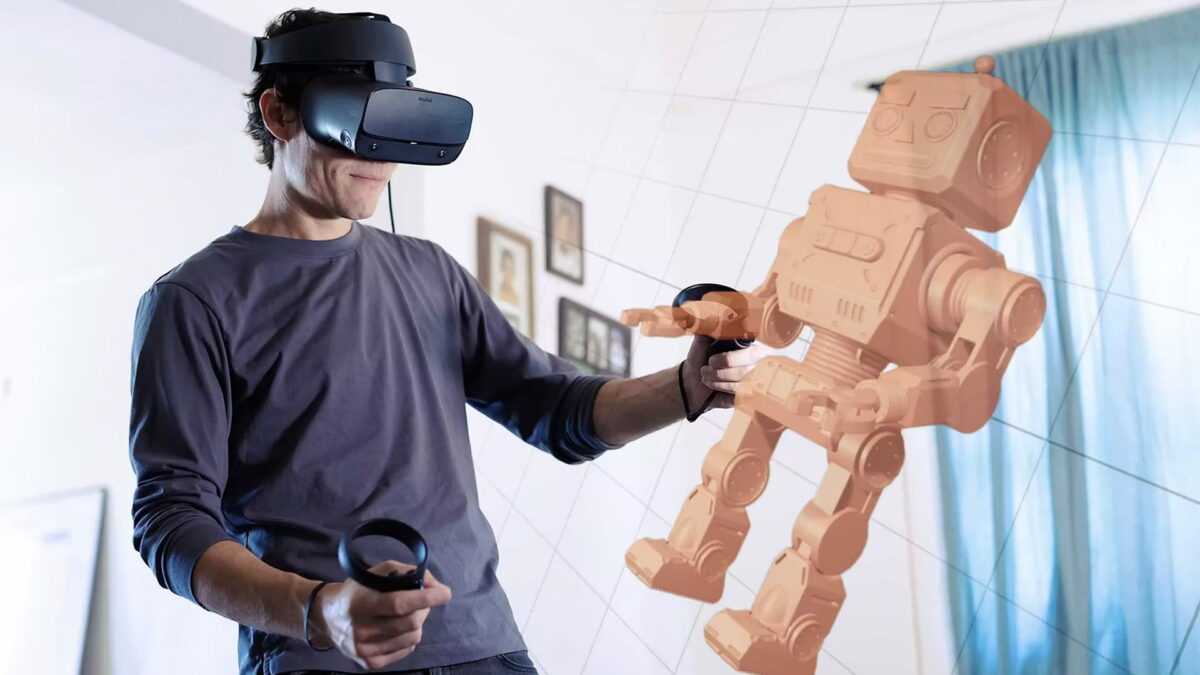 Man with Oculus Rift S models a robot figure in a living room.