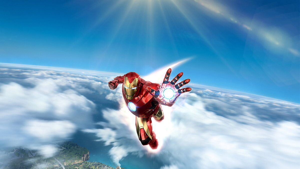 Iron Man flies above a cloud cover with an outstretched hand towards the viewer.