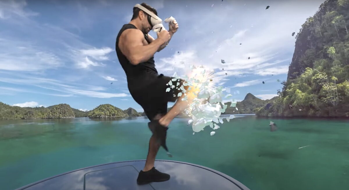 Man with Quest 2 raises his knee and smashes a note in a Caribbean landscape of the VR app Supernatural.