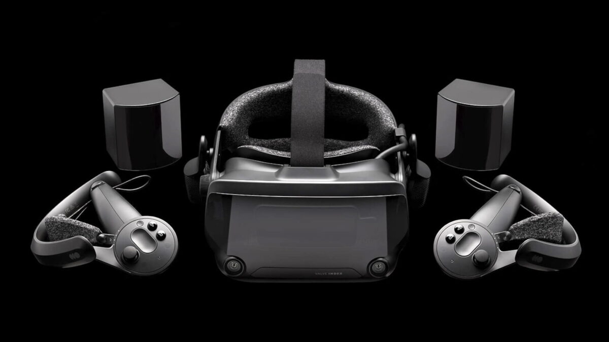 Valve Index with index controllers and base stations against black background