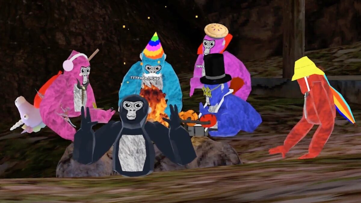 A group of colorful gorilla avatars have gathered around a fire.