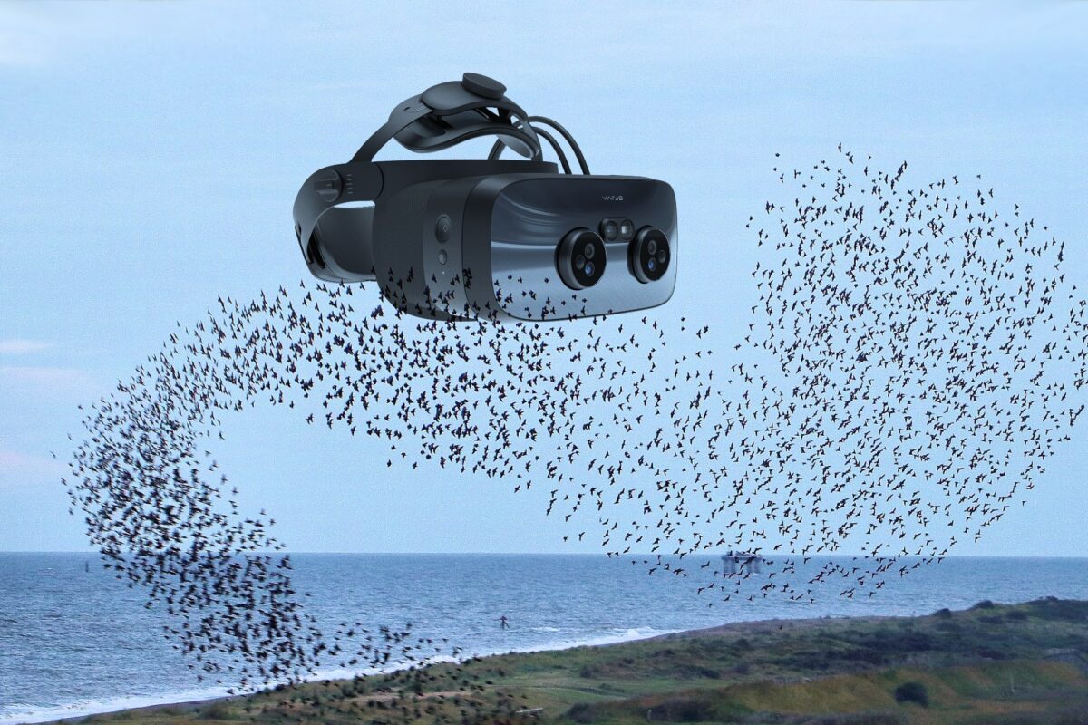 A Varjo XR-3 headset appears within a murmuration of starlings.