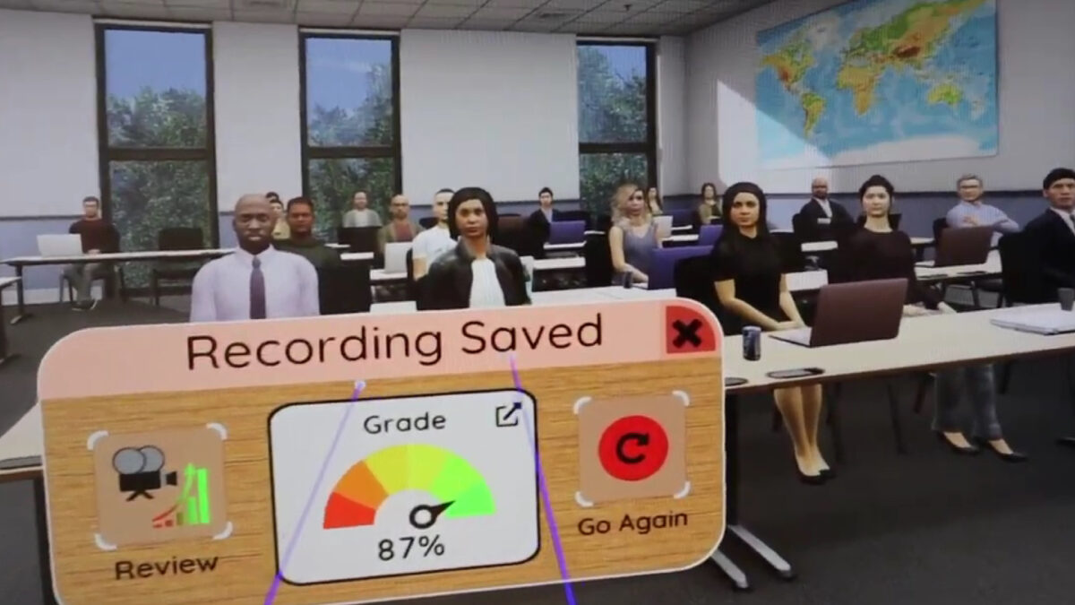 A virtual reality simulation takes the user in a classroom where he stands in front of the students.