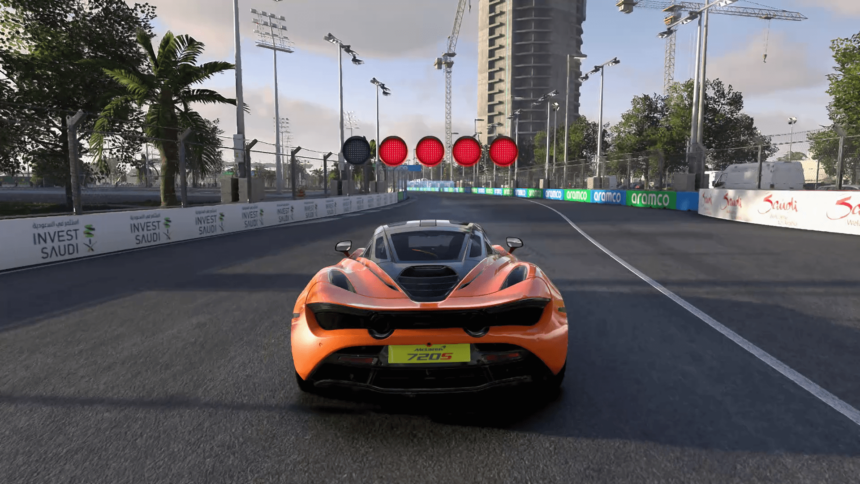 The PC game F1 22 in monitor mode at the Grand Prix Saudi Arabia shows an orange MacLaren F1 in the corner.