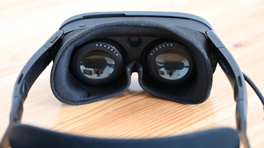 VR headset Vive XR Elite on a table, view of the lenses