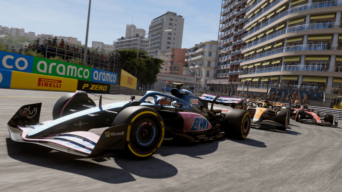 Several Formula 1 cars in a curve in Monaco.