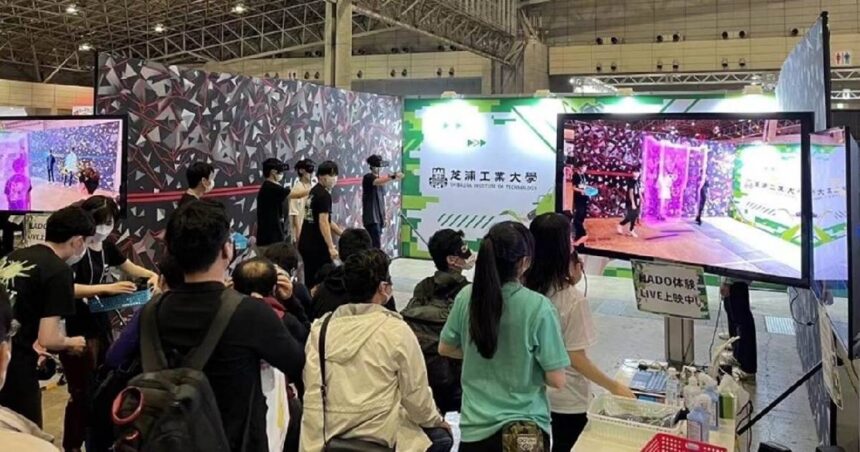 People playing a video game in an exhibition hall.