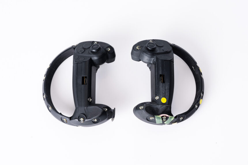 A prototype of two controllers for PSVR2, reminiscent of Valve's Index controller.