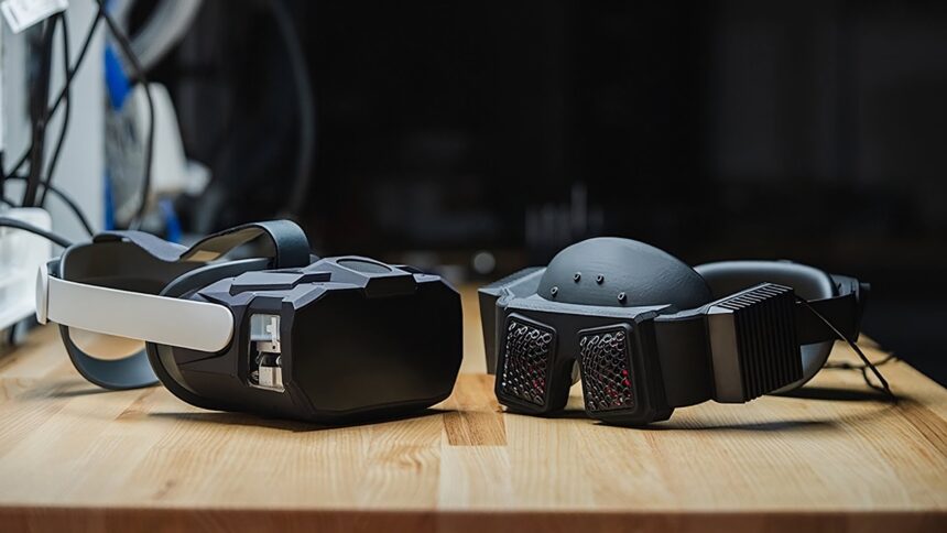 The Butterscotch Varifocal and Flamera headset prototypes lie side by side on the table.