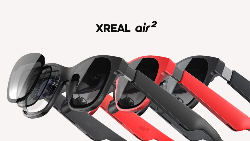Three different colored versions (black, red, gray) of the AR headset Xreal Air 2.
