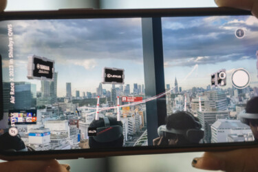 AR flying race view of Shibuya through smartphone image