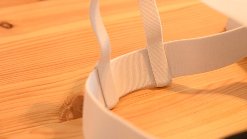 Behind head mount of the soft strap of the Quest 3 VR/AR headset on a table
