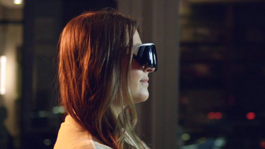 A profile view of a person wearing the Immersed Visor.