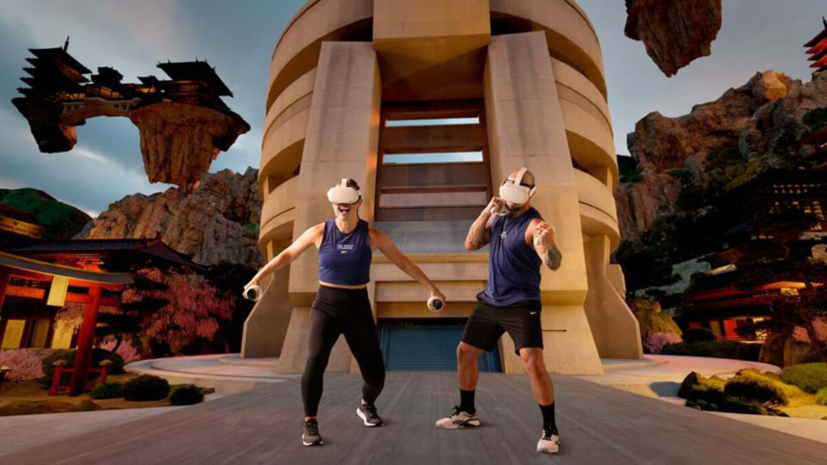 A screenshot of Les Mills Bodycombat shows a man and a woman wearing VR headsets.