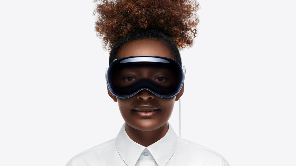 Woman with Vision Pro and superimposed eye area against a white background.