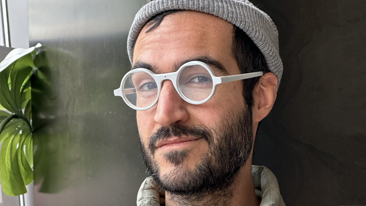 Brilliant Labs CEO wears Frame AI smart glasses.