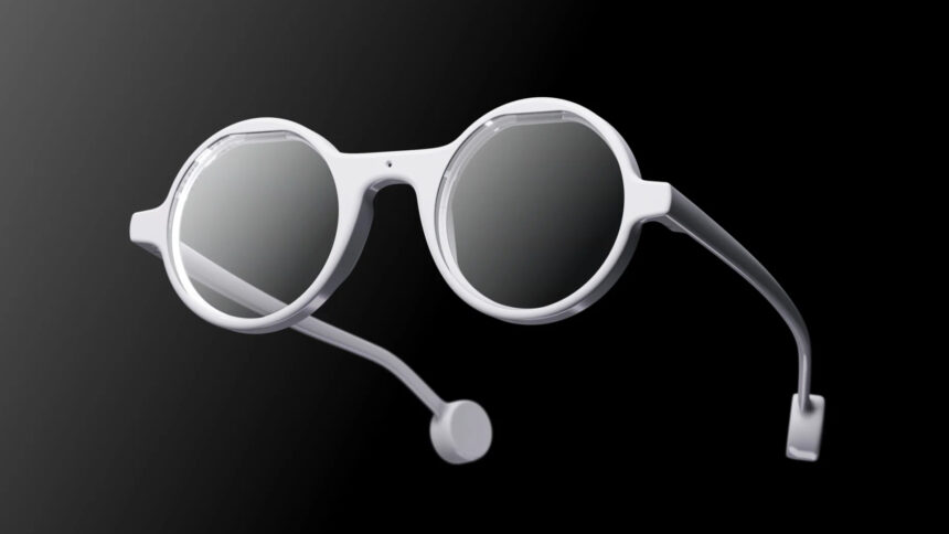 The Frame AI smart glasses with a round, bright design on a black background.