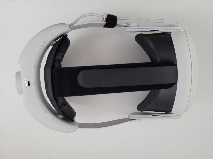 A Meta Quest 3 VR headset with a Kiwi Comfort Battery Headstrep from above.
