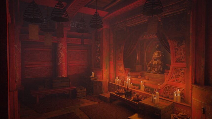 An atmospherically lit room with a niche for a Chinese deity.