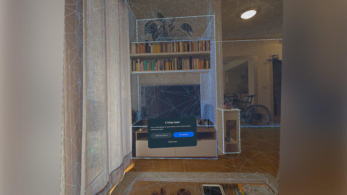 A living room scanned with Space Setup with lines showing the outlines of walls and objects.