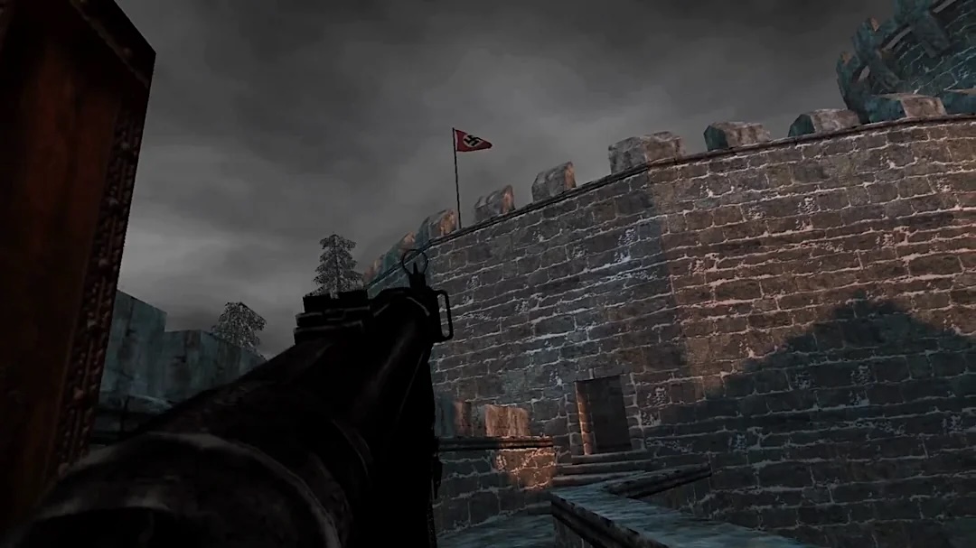 The player aims a machine gun at a fortress with a Nazi flag.
