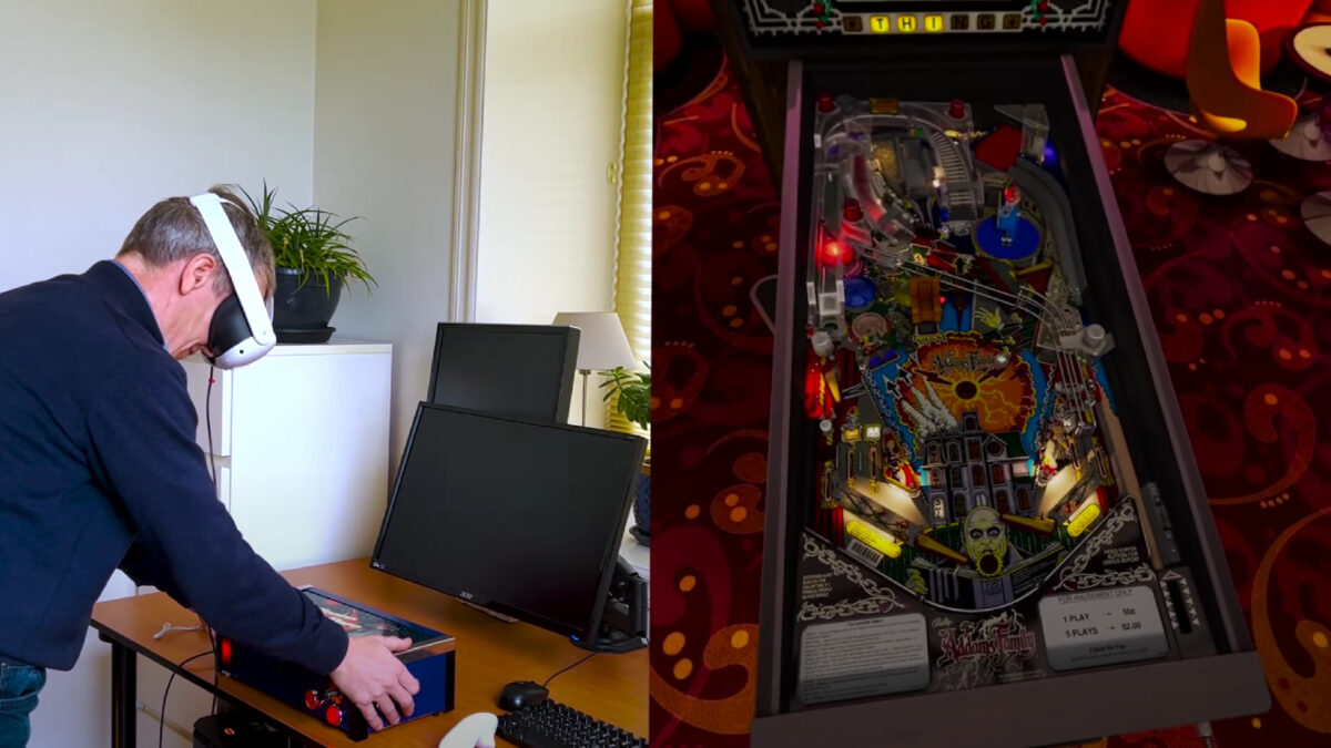 A man with a Meta Quest 3 VR headset on his head plays a VR pinball game, which he controls with a special pinball controller.