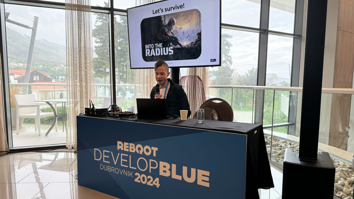 Sergei Kharchenko gives a presentation at the Reboot Develop Blue 2024.